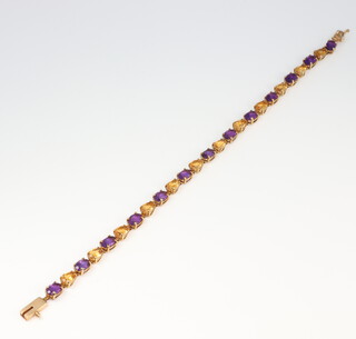 A yellow metal amethyst and gem set bracelet 6.7 grams, 18cm 