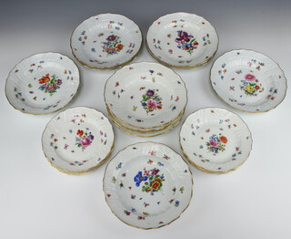 A matched set of Meissen dinnerware comprising 6 large plates 24cm, 6 small plates 20cm (1 chipped) and 5 soup bowls 23cm, all profusely decorated with spring flowers and insects  