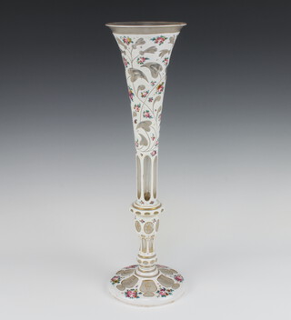 A 19th Century Bohemian white flash tapered vase decorated with flowers with gilt highlights 41cm 