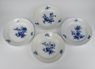 A set of four 19th Century Meissen blue and white plates decorated with flowers and butterflies 24.5cm 