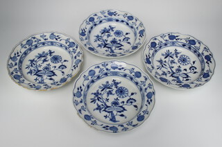 A matched set of 4 19th Century Meissen blue and white bowls decorated with fruits and flowers 23cm 
