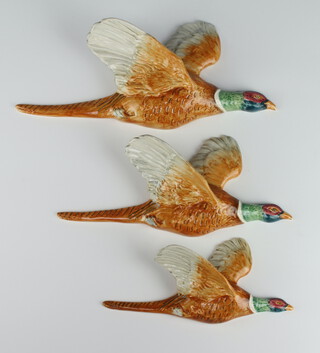 A set of 3 Beswick pheasant wall plaques 661/1, 661/2 and 661/3 