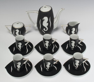 A stylish mid-Century Thistledown coffee set, the black ground decorated with a seahorse and comprising coffee pot, 6 coffee cans, milk jug, lidded sugar bowl and 6 saucers 
