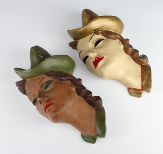 Two Art Deco plaster wall masks in the form of ladies one signed B Collin 28cm 