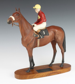 A Beswick Connoisseur model - Red Rum Brian Fletcher Up 2511 raised on an oval wooden socle base, modelled by Graham Tongue, 30cm 
