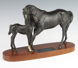 A Beswick group - Black Beauty and foal 2235 matt black, modelled by Graham Tongue 24cm 