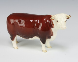 A Beswick figure - Hereford Cow 1360 gloss, modelled by Arthur Gredington 10.8cm