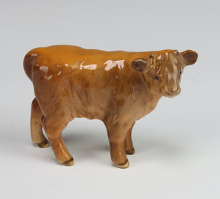 A Beswick figure - Highland Calf 1827D, tan gloss, modelled by Arthur Gredington 7.6cm 