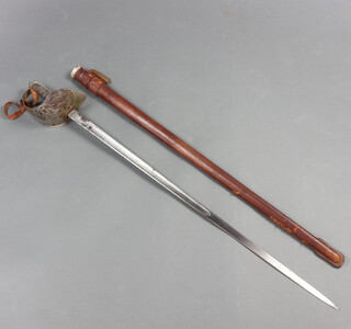 Henry Wilkinson, a George V Infantry Officer's sword, the top of the blade marked 47694, complete with leather scabbard marked with a crowned W 