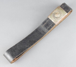 A Third Reich leather belt with impressed metal buckle marked Gott Mit Uns 