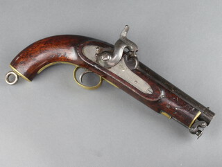 A Victorian Tower percussion coast guard/naval pistol with 15cm barrel, Tower Lock marked 1849, the top of the barrel with numerous proof marks and a crowned 17, the wooden grip is marked with a crowned XI in 2 places and a crowned 17, impressed Broadarrow OB W Scott, with stirrup ram rod 