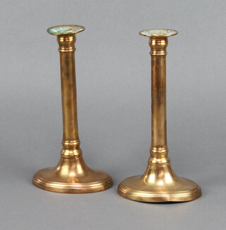 A pair of 19th Century Adam style copper candlesticks raised on oval bases 23cm h x 12cm w x 9cm d (1 has a misshapen base) 