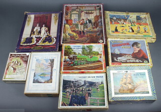 A Ponda jigsaw puzzle - A Rare Piece complete and boxed, a Bel ditto Their Majesties King George VI and Queen Elizabeth complete and boxed, a Hall-Court ditto Sports and Travel Series boxed, a Society Dissected ditto complete and 5 various Victory puzzles - The Circus (1 piece broken), Miniature Express (complete), The Dagenham Girl Pipers (complete), HMS Victory (1 piece missing) and The Geographical double sided (5 pieces missing)   