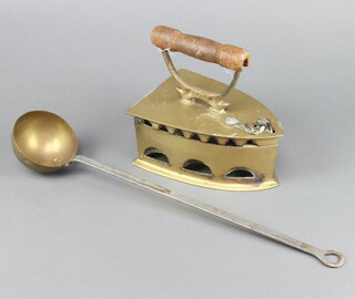 A Lion brass and steel box iron (no slug), together with a brass and steel ladle 