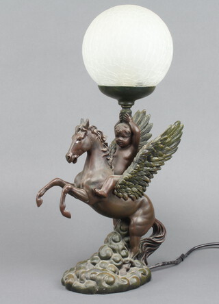A bronzed table lamp in the form of Pegasus with cherub and crackle glass shade 47cm h x 16cm x 14cm 
