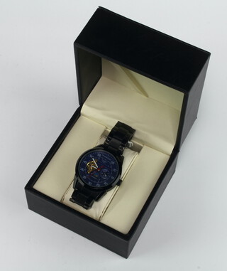 A gentleman's Swan and Edgar moon phase wristwatch on a black plastic bracelet, boxed 