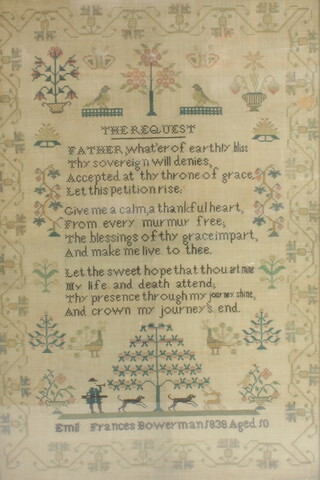 A 19th Century sampler "The Request" by Emil Frances Bowerman 1838 aged 10, contained in a surround of birds, trees and vases of flowers with a huntsman, dogs and deer beneath a tree 46cm x 30cm 