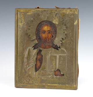 A 19th Century Russian Orthodox  icon, oil on panel, of Christ The Pantocrator, contained in a repousse brass oklad 22cm x 18cm  