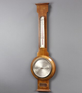 F C Scott of Bristol, a 1930's aneroid barometer and thermometer with silvered dial contained in a walnut banjo case 89cm h x 23cm w 