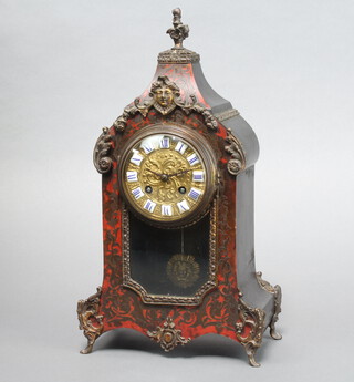 A 19th Century French 8 day striking on bell mantel clock with gilt dial and porcelain Roman numerals contained in a red boulle case, the back plate marked 024698, complete with pendulum and key 39cm h x 21cm w x 11cm d 