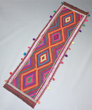 An orange, red and tanned ground Suzni runner with 4 diamonds to the centre 263cm x 75cm 