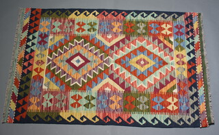 A Chobi Kilim rug with all over geometric design 154cm x 100cm