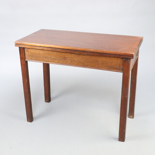 A 19th Century rectangular mahogany tea table on square supports 73cm h x 90cm w x 45cm d 
