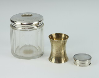 A circular silver pill box Birmingham 1928 3.5cm, a hair tidy and a waisted silver tot, weighable silver 76 grams 
