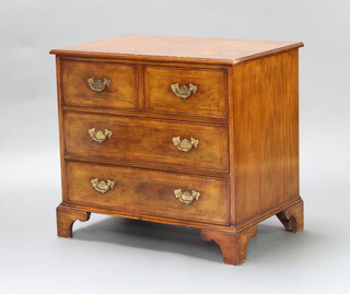 A Queen Anne style crossbanded walnut chest of 2 short and 2 long drawers raised on bracket feet 69cm h x 75cm w x 50cm d 
