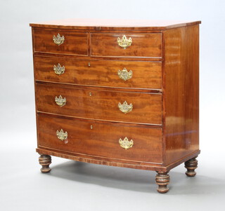 A 19th Century mahogany bow front chest with ebonised stringing, fitted 2 short and 3 long drawers with replacement brass drop handles, raised on turned supports 110cm h w x 110cm w x 59cm d  
