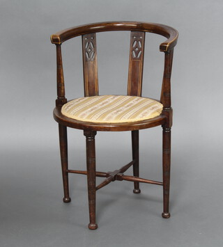 An Edwardian tub back inlaid mahogany chair raised on turned supports with X framed stretcher 75cm h x 50cm w x 47cm d (seat 30cm diam.) 