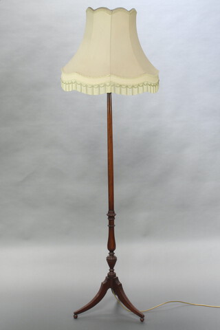 A Georgian style turned mahogany standard lamp complete with green shade 141cm h x 43cm 