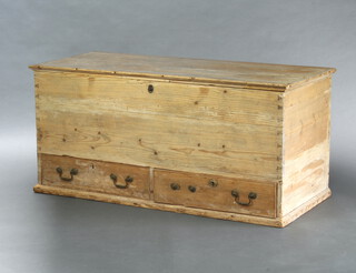 A 19th Century pine mule chest with hinged lid, base fitted 2 drawers with brass swan neck drop handles 55cm h x 118cm w x 51cm d 