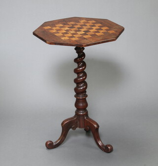 A Victorian octagonal inlaid rosewood chess table, raised on a spiral turned column and tripod base 72cm h x 49cm w x 49cm d 