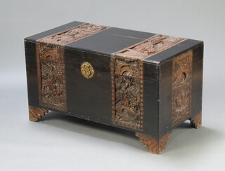 A Chinese carved camphor coffer with hinged lid 56cm h x 101cm w x 52cm d 