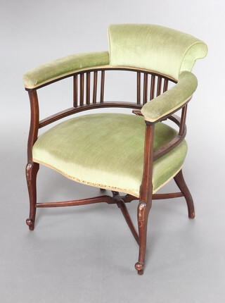An Edwardian inlaid mahogany tub back chair upholstered in green material raised on cabriole supports 80cm h x 63cm w x 54cm d (seat 34cm x 37cm) 