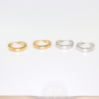 A pair of 9ct white gold hoop earrings and a pair of 9ct yellow gold hoop earrings, 4 gms