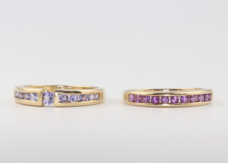 A 9ct yellow gold gem set amethyst ring and one other, size O, 4gms