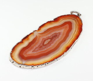 A silver mounted banded agate pendant, 75mm x 35mm, 