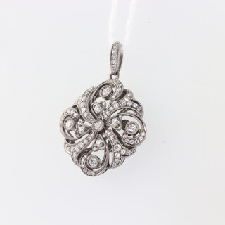 A white metal, stamped 750, Edwardian style diamond pendant, 22mm, 4.7gms, 