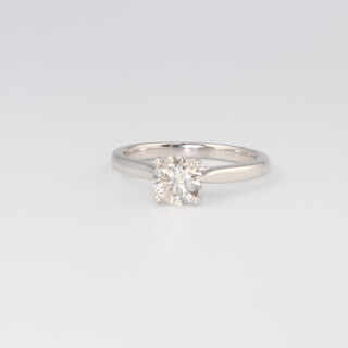 An 18ct white metal single stone brilliant cut diamond ring, approx 0.94ct, size M, 3.1gms with WGI certificate