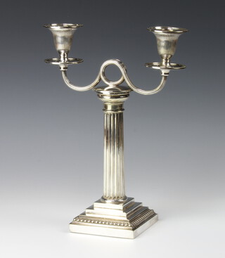 A plated two light candlestick with column support and stepped base, 29cm 