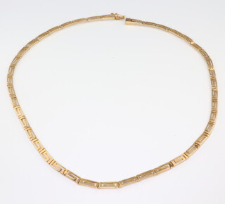 A yellow metal, stamped 585, flat link necklace, 42cm, 13gms