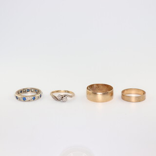 Two 9ct gold wedding bands, sizes N and U, 5.5gms, two gem set rings, gross 6.1gms 