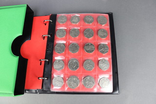A collection of 156 current 50pence pieces, including London Olympics/Paralympics  2012, Isle of Man, Guernsey, Paddington, Beatrix Potter and the Queen's 70th Jubilee