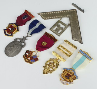 A plated Past Master jewel, five other Masonic jewels