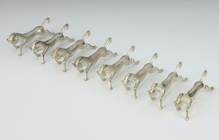 A set of 8 silver plated horse knife rests 8cm
