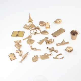 A collection of 9ct charms, 27gms (1 charm weighted)