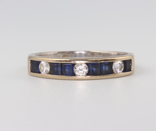 An 18ct white gold princess cut sapphire and diamond half eternity ring, size L 1/2, 3.3gms