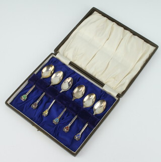 A set of 6 silver and enamelled coffee spoons Birmingham 1922, 40 grams, maker Joseph Gloster Ltd 